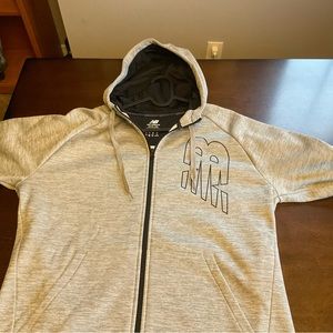 New Balance zip up Hoodie, only used once or twice inside. Pristine condition